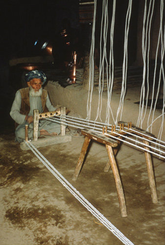 Afghanistan, Tashaurgan, covered bazaar, rope maker